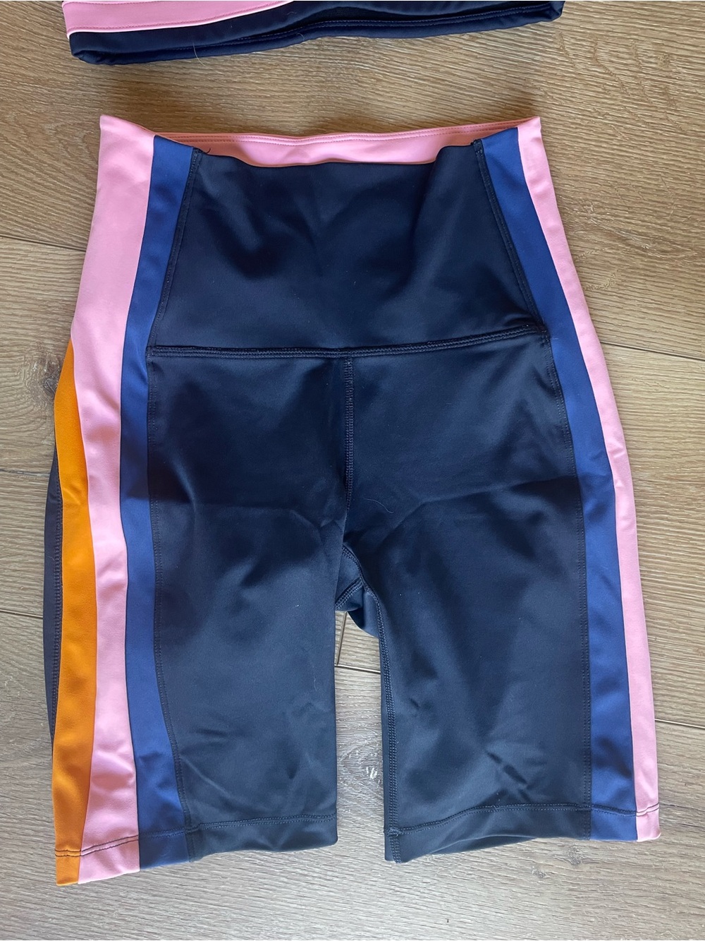 Splits59 Navy Bike Shorts & Sports Bra with Pink and Orange Trim - Picture 2 of 6